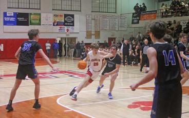 Press file photo - Freshman Lance Parker drives to the basket versus Smoky Mountain Jan. 12.