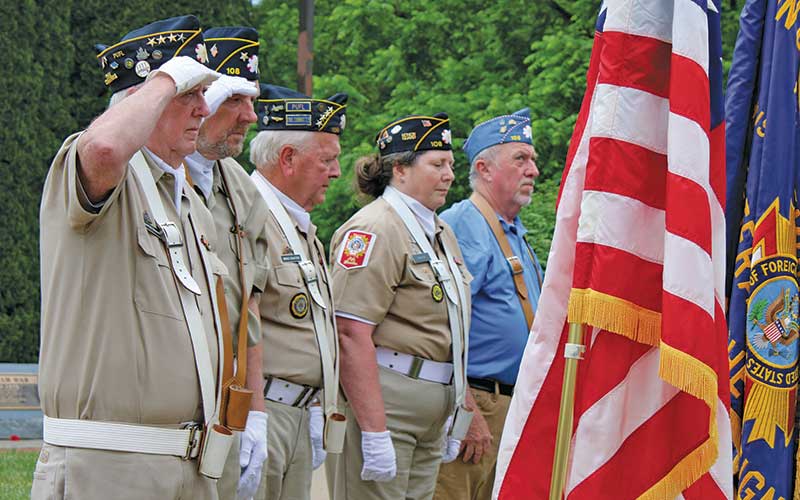 Press photo/Vickie Carpenter - Members of the VFW 7339 and American Legion Post 108 salute the colors during the Memorial Day ceremony on May 25, 2026. See more photos on The Franklin Press Facebook page.