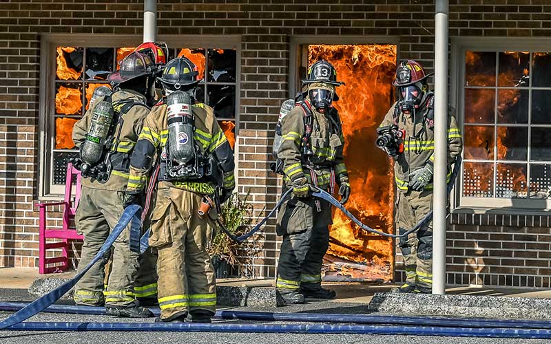 Photo/Bob Scott - Crews from multiple fire departments responded to a Sunday morning fire at Village Plaza on Highlands Road.