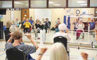 Press photo/Shelby Powell - Kim Terrell, from the Macon County Cooperative Extension, leads a balance class on Tuesdays and Thursdays at 9 a.m. at the Crawford Senior Center.