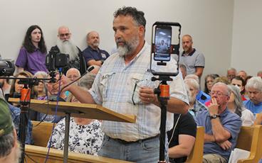 Press photo/Shelby Powell - Chuck Watson speaks out against data centers in Macon County in the Macon County Board of Commissioners' July 14 meeting.