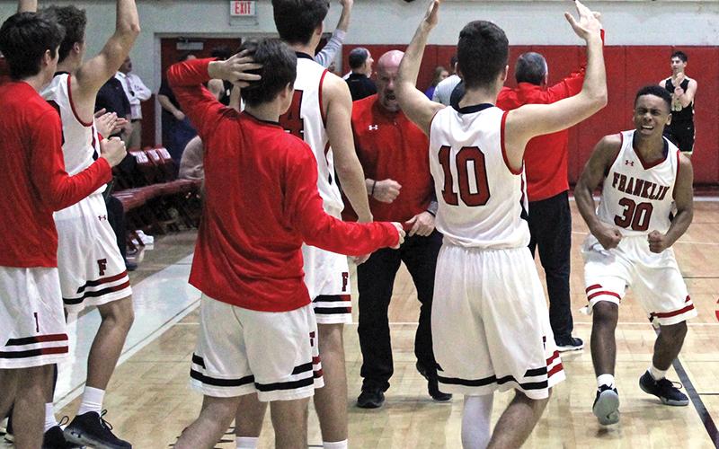 Press photo/Andy Scheidler Chad Wilson (30), Trey Woodard (10) and Franklin players and coaches celebrate moments after surviving to hold off Hayesville in Monday’s home game. The Panthers improved to 2-1 on the season.