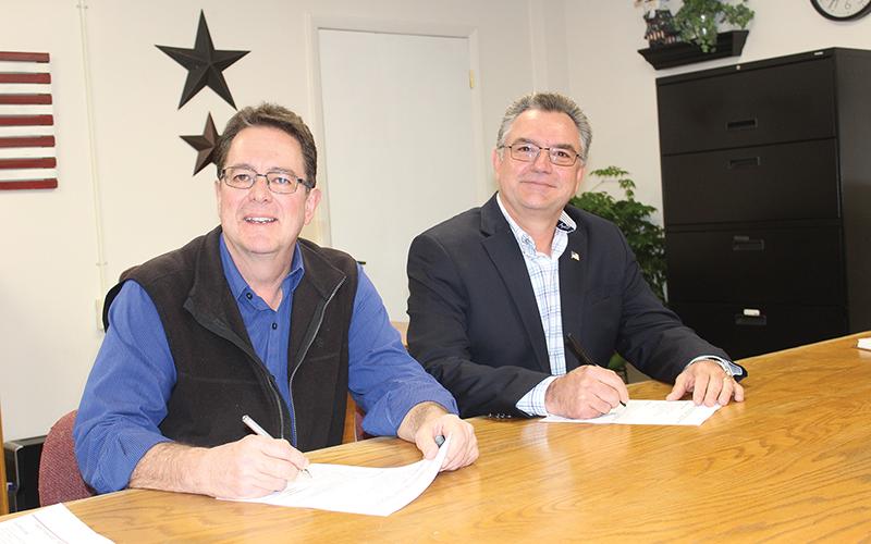 Press photo/Jake Browning - Kevin Corbin, left, and Karl Gillespie filed on Monday at the Macon County Board of elections.