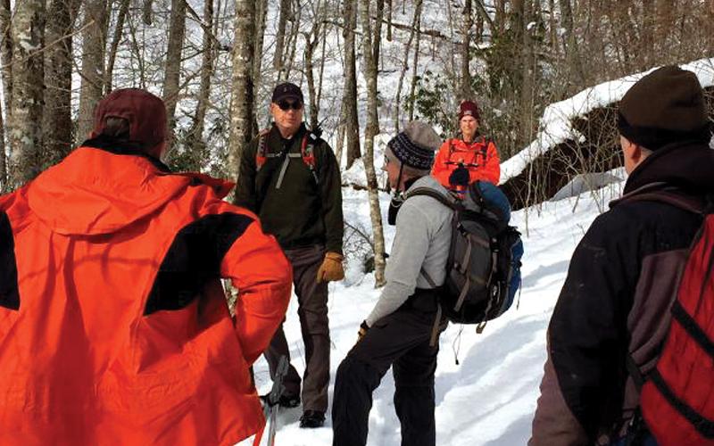 volunteers with the Nantahala Hiking Club meet before beginning a trail maintenance work day.