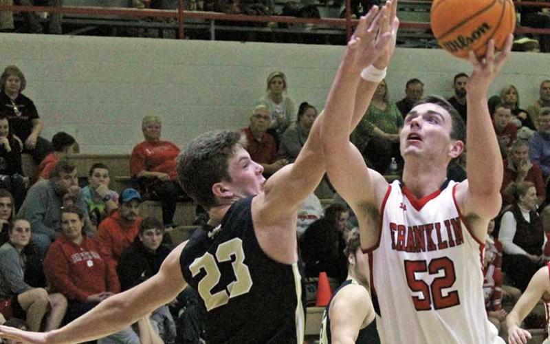 Press file photo - Chris Hartbarger, a 6-foot-7 center, will join Warren Wilson College to continue his basketball career and pursue a pre-med degree.