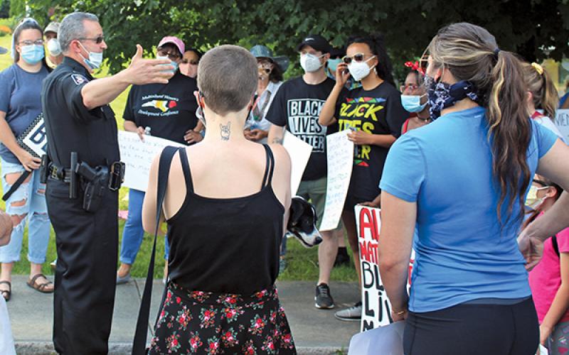 Press photo/Jake Browning - Franklin Police Chief Bill Harrell talks with protestors before the second Black Lives Matter rally in Franklin.