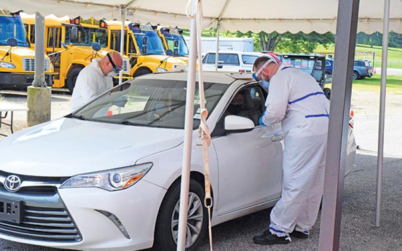 Press photo/Linda Mathias - Macon Public Health held a free drive-thru testing event at Macon Middle School.