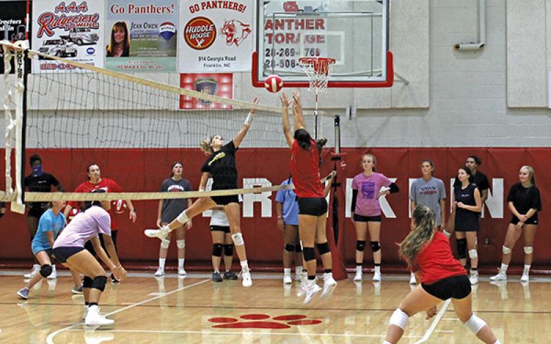 Press photo/Will Woolever - Members of the Franklin High School volleyball team work out at the school gym. Official practice begins Nov. 4.