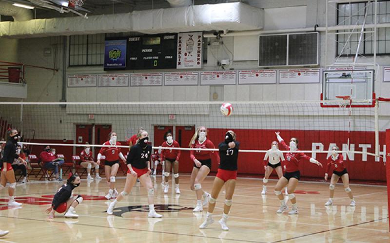 Press Photo/Will Woolever - Setter Tori Ensley, No. 17, sends a ball over the net in the Panther’s home match againt Hendersonville last Monday. The Panthers went 1-1 against two Mountain Six contenders in Hendersonville and Brevard last week.