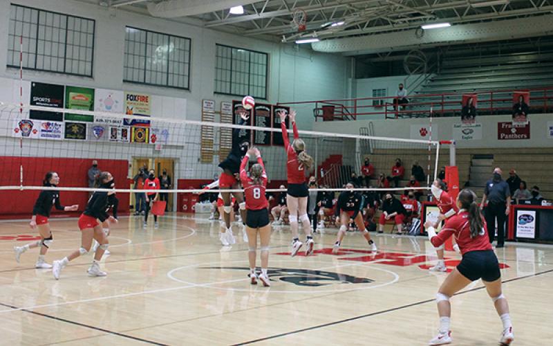 Photo submitted - Middle blocker Anya Valentine sends a spike over the net in a game against Hendersonville Now. 16. Valentine was dominant