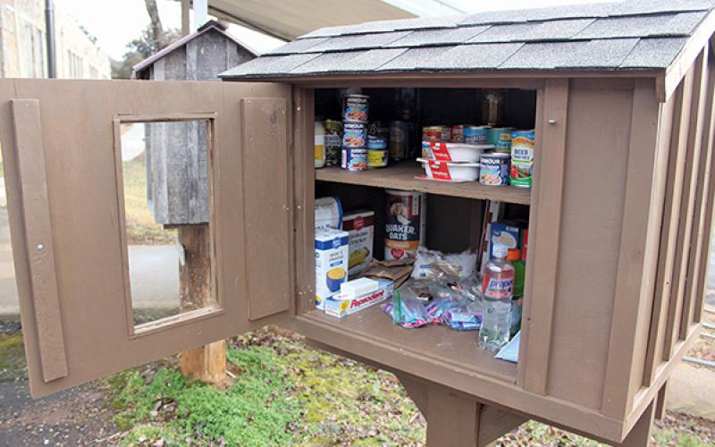 Press photo/Jake Browning - Little food pantries, including this one at Cowee School, have popped up across the county.