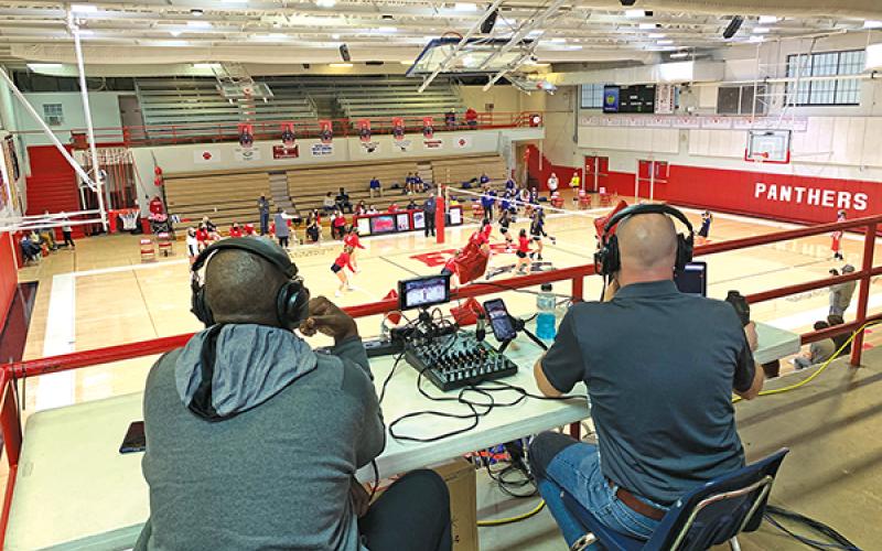 Press Photo/Will Woolever - Franklin Panther Sports Network color commentator Tony Christie (left) and play-by-play announcer George Young overlook Tom Raby Court while calling a recent JV volleyball match.