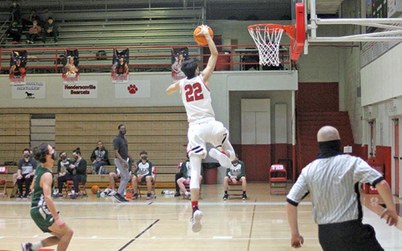 Press Photo/Will Woolever - Junior guard Griffin Green goes up for a dunk in a game against East Henderson Feb. 5. The Panthers will look to secure a berth in the Mountain Six tournament after moving to 4-3 on the season.