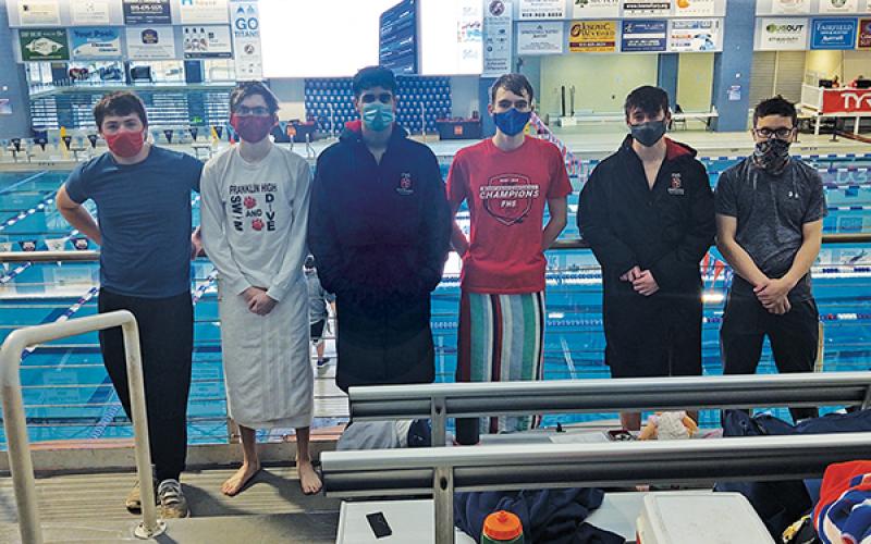 Press Photo/Will Woolever - Franklin Boys Swim Team members (from left) Kyler Cochran, Luke Borgmann, Michael Frazier, Caden Tyler, Clayton Guynn, and Hunter Cabe are pictured at the NCHSAA Championship Swim meet Feb. 12. Franklin tied for 20th out of 28 teams statewide.