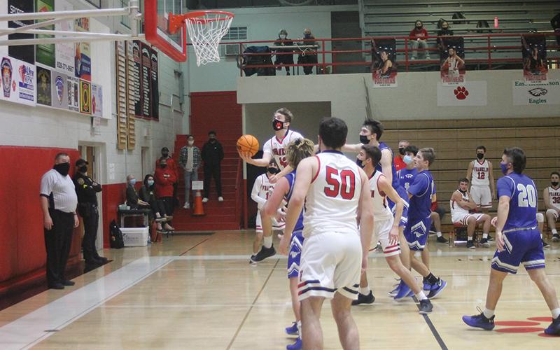 Press photo/Will Woolever - Junior guard Keagan Pollock attempts a layup in the Panther Den against Smoky Mountain Jan. 27. Franklin’s boys team got its first two wins to move to 2-3 on the season.