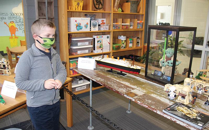 Press photos/Jake Browning - Second-grader Ryder Murphy is a big Star Wars fan, as evidenced by the figures of Yoda and Baby Yoda at right.
