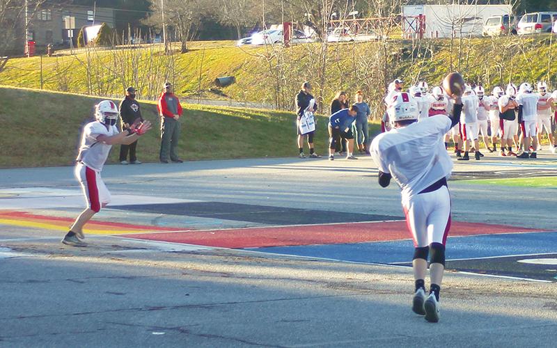 Press Photo/Will Woolever - Freshman quarterback Beau Paulson throws a pass in a recent Panther practice. Franklin faces Hendersonville in its first home game March 12 after falling to Murphy 48-14.