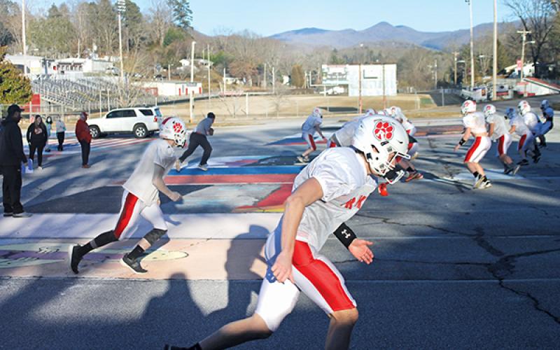 Press photo/Will Woolever – Junior tight end Austin Pittman and senior wide receiver Seth Crupi get off the line in a drill during a recent Panther practice. The Panthers defeated Hayesville 28-7 March 1 to begin the season.