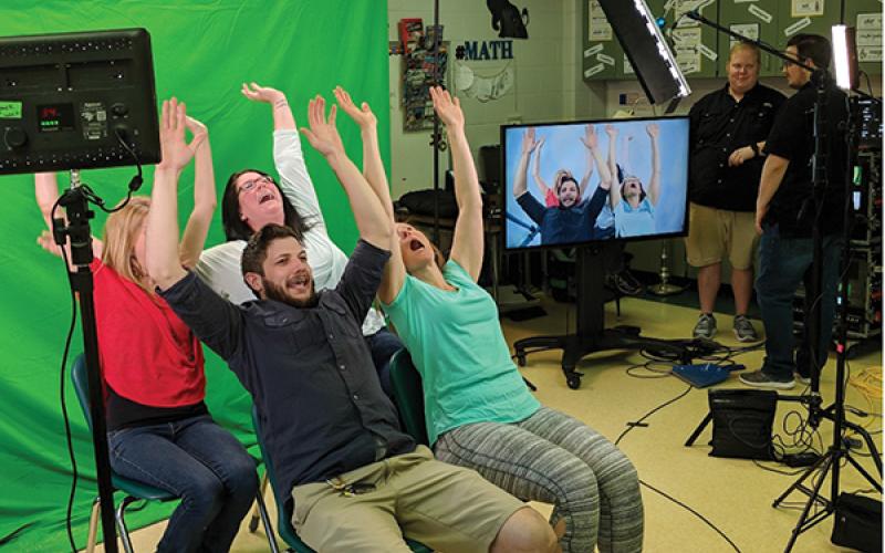 Photo submitted - Backlot Cinema teamed up with the Macon County Schools STEM program for a unit on video technology and production careers, demonstrated here with the use of a green screen.