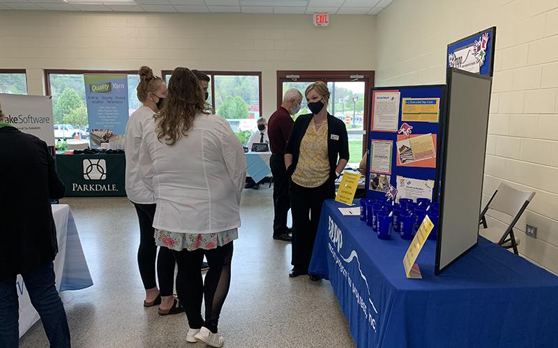 Macon Program for Progress human resources coordinator Lacy Carpenter discusses openings with a group of nursing students from Southwestern Community College.