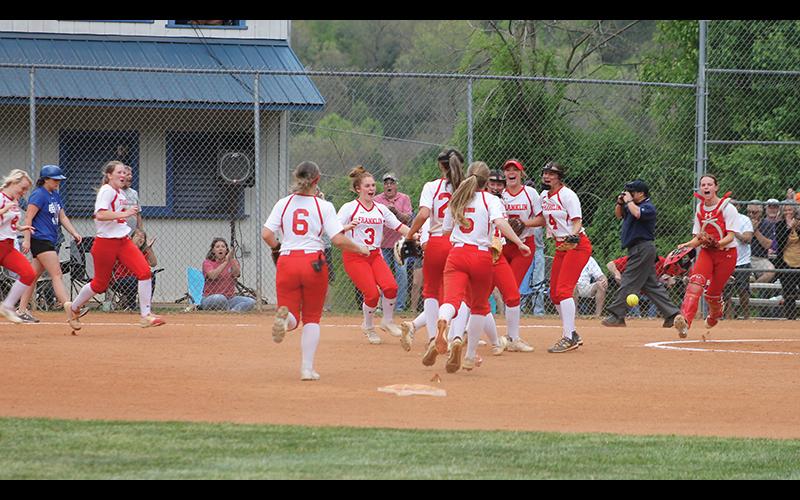 Press photo/Will Woolever - Panther players celebrate after earning the final out against Smoky Mountain April 29. The Panthers defeated the Mustangs, at the time the state’s top-ranked 2A team, to advance to the first round of the state playoffs this week.