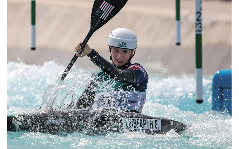 Photo courtesy of ICF Photography - Bryson City native Evy Leibfarth navigates through obstacles in a recent canoe slalom event. Leibfarth competed in the first-ever Olympic women’s canoe slalom event last week at just 17 years of age.