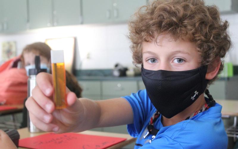 Press photo/Jake Browning - Fifth grader Cam English holds up a case of mechanical pencil graphite. English was surprised to learn how similar a vape pen can look to this common school supply, but anti-smoking advocates say that’s an intentional design choice meant to facilitate vaping for younger consumers.