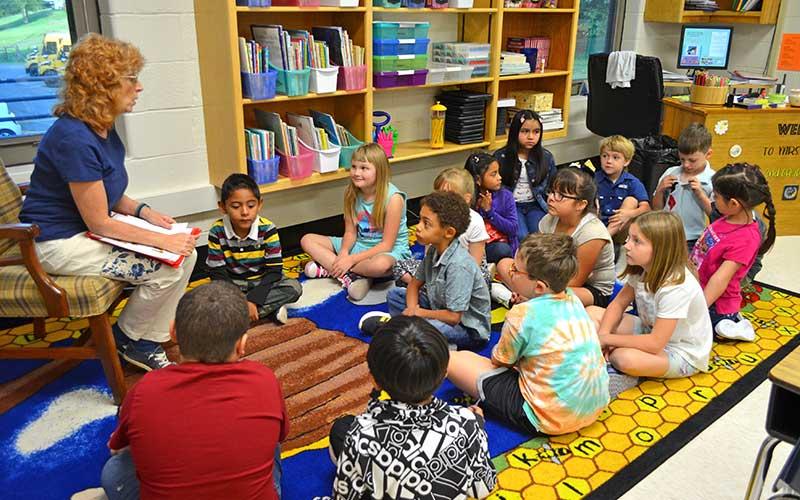 Press photo/Mia Overton - Students take turns introducing themselves on the first day of school in Maureen Pruett’s second grade class at East Franklin Elementary.