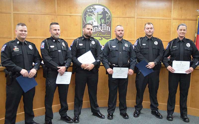 Press photo/Mia Overton - Police Chief Bill Harrell announced several promotions within the department during Monday night’s Town Council meeting. Pictured (from left) First Sgt. Randy Dula, Street Poisons Enforcement Eradication Directive; Capt. Matt Pellicer, Criminal Investigations Division and Support Services; First Sgt./Detective Justin Norman, investigations; Patrol Sgt. Justin Riles; Patrol Sgt. Matthew Bingham; Master Officer III Kelly Jo Fosler.