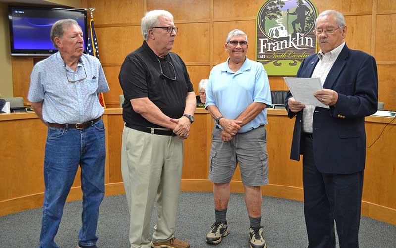 Press photo/Mia Overton - Franklin Mayor Jack Horton (right) presents a proclamation recognizing Sept. 4-10 as Help Homeless Veterans Week. Accepting the proclamation at the July Town Council meeting are (from left) Fred Frankland, Tom Fagg and Ned Kraft of the First Presbyterian Church Men’s Group.