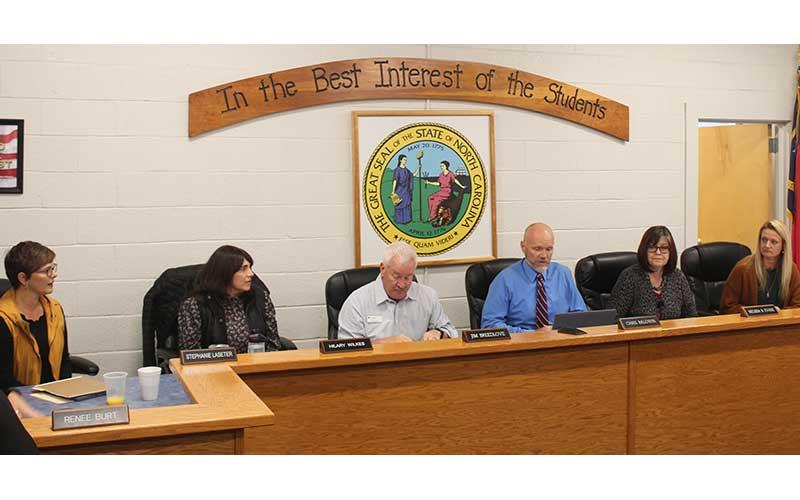 Press photo/Thomas Sherrill - The Macon County Board of Education held its first meeting with newly board members Stephanie Laseter and Diedre Breeden on Monday morning following a swearing-in ceremony. Jim Breedlove was selected to remain as board chairman and Melissa Evans will serve as vice chair. Pictured are Laseter, Hilary Wilkes, Breedlove, Superintendent Chris Baldwin, Evans and Breeden.