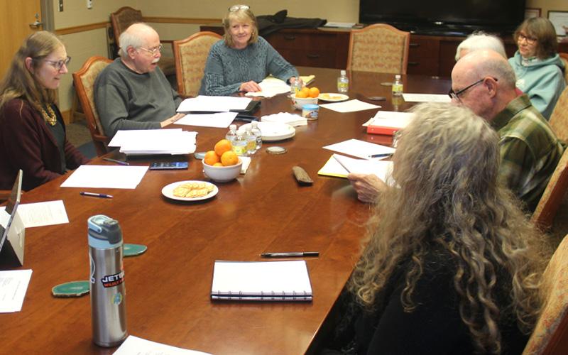 Press photo/Thomas Sherrill The Macon County Public Library Board of Trustees at their Dec. 20 meeting.