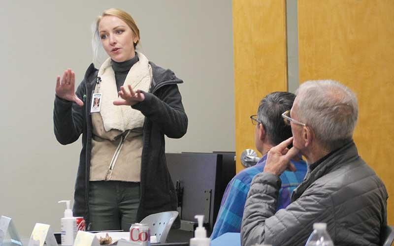 Press photos/Thomas Sherrill - Marianne Martinez, executive director of Vecinos, speaks Jan. 24 to the Macon County Health Board on the Community Health Hub that is slated to open in 2024.