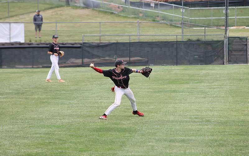 Eighth-grade center fielder Damion Bowles throws back to the infield during the Blue Ridge Athletic Conference Championship game May 11 at McConnell Field.