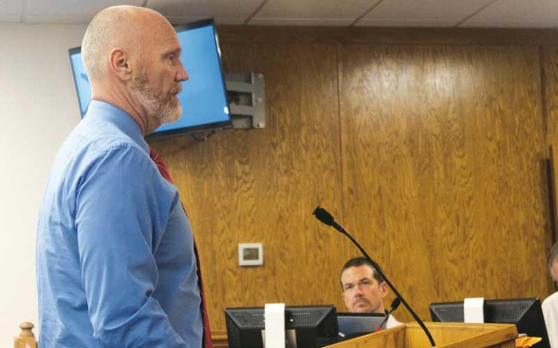 Press photo/Thomas Sherrill - Macon County Schools Superintendent Chris Baldwin speaks to the Macon County Commissioners during the May 30 budget workshop.