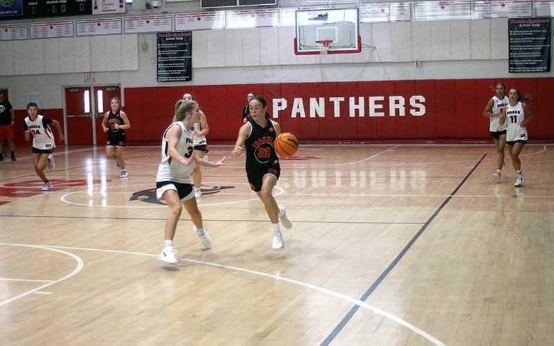 Press photo/Will Woolever - Promising freshman Audrey Pressley dribbles upcourt in Franklin’s scrimmage versus Pisgah June 12.