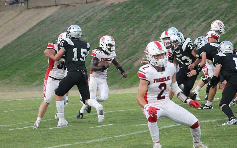 Press photo/Will Woolever - Junior Eli Brown carries the ball out of the backfield against Robbinsville Aug. 25. Brown looked sharp as Franklin’s leading rusher on the night with 19 carries for 69 yards.
