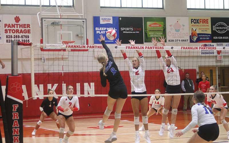 Press photo/Will Woolever - Outside/opposite Hitters Aubrey Haley (left) and Talley Kinsland attempt a block versus Smoky Mountain Sept. 7.