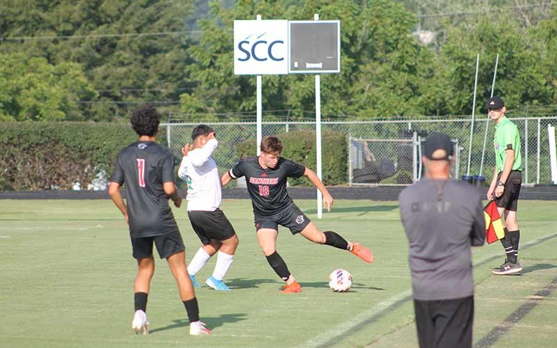 Press photo/Will Woolever - Senior defender Jaydon Pevia battles for possession in a recent match at the Panther Pit.