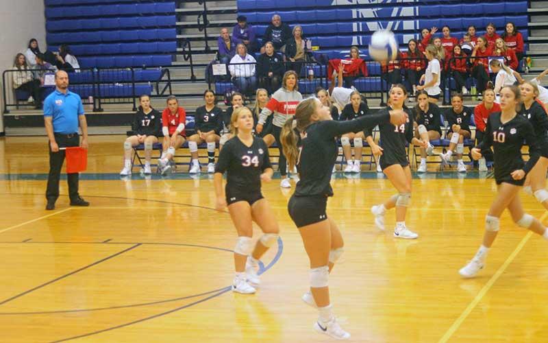 Press photo/Will Woolever - Senior McCall Sanders sets a ball for teammates in the Mountain Seven Semifinal versus Smoky Mountain Oct. 16.