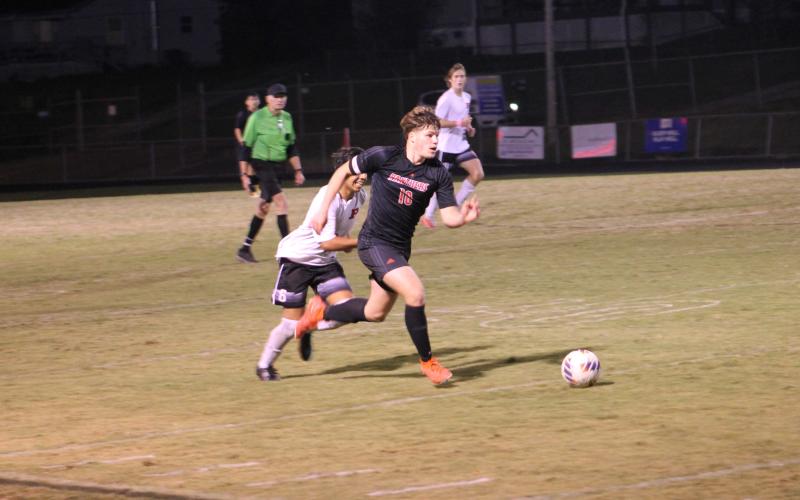 Press photo/Will Woolever - Senior Jaydon Pevia makes a run upfield against Pisgah Oct. 11.