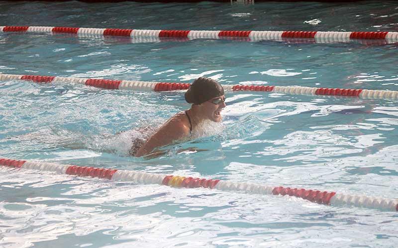 Press photo/Will Woolever - Senior Claire Ballard swims the 100-yard breaststroke in Franklin’s first meet of the season Nov. 18.