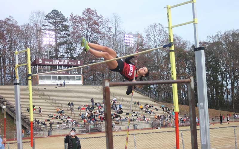 Press photo/Will Woolever - Reigning 3A Indoor Pole Vault State Champion Boston Stringer clears the bar in Franklin’s first meet at Swain Nov. 15.