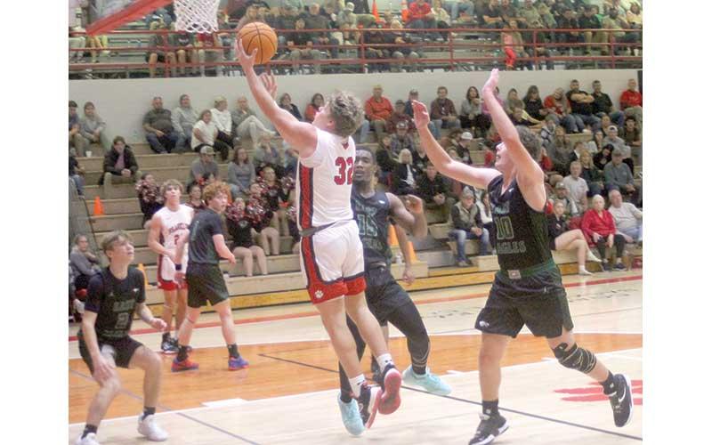 Press photo/Will Woolever - Junior center Braydon Hervey attempts a layup versus East Henderson Dec. 15.