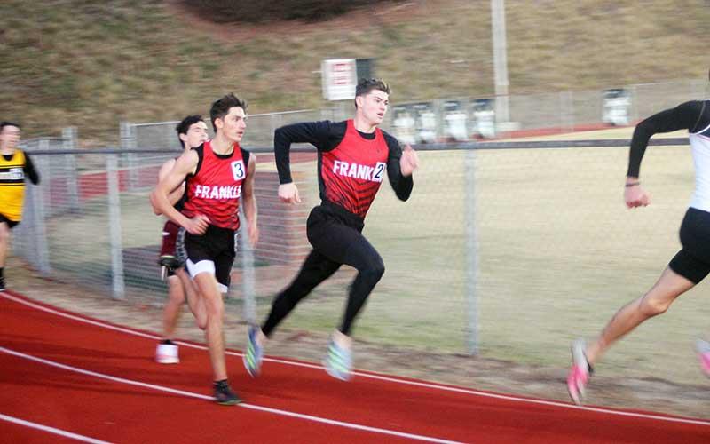 Press file photo - Sophomore Justin Rodriguez (left) and senior Elijah Cochran run the 500-meter dash  at Swain Nov. 29.
