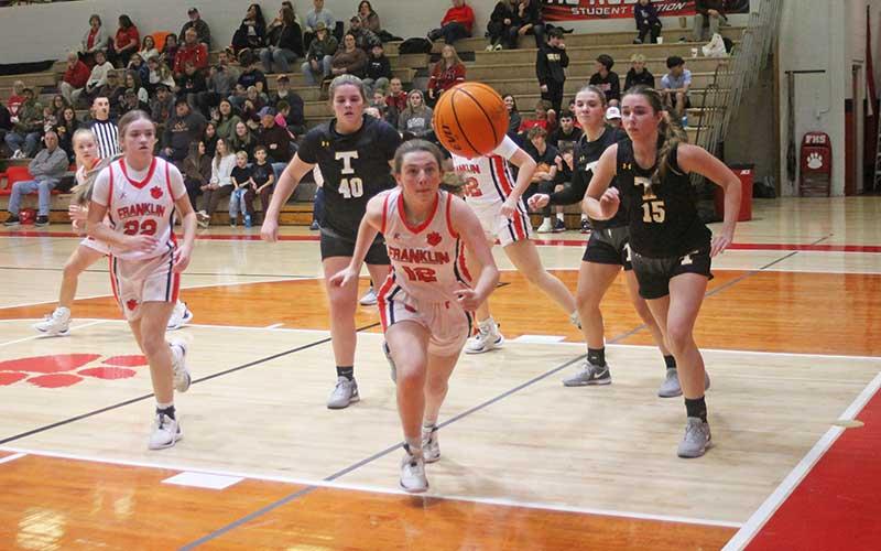 Press photo/Will Woolever - Sophomore guard Layla Reeves chases a loose ball versus Tuscola on Tom Raby Court Dec. 19.