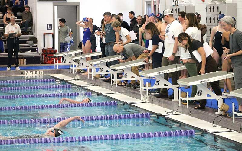 Press file photo - Freshman Eleanor Kessler finishes the 100-yard backstroke at T.C. Roberson Jan. 13.