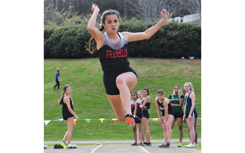 Photo/Enoch Autrey/Clayton Tribune. Then-MEC freshman Laura Covarrubias competes for Franklin in the long jump at Rabun Gap-Nacoochee School March 31, 2022.