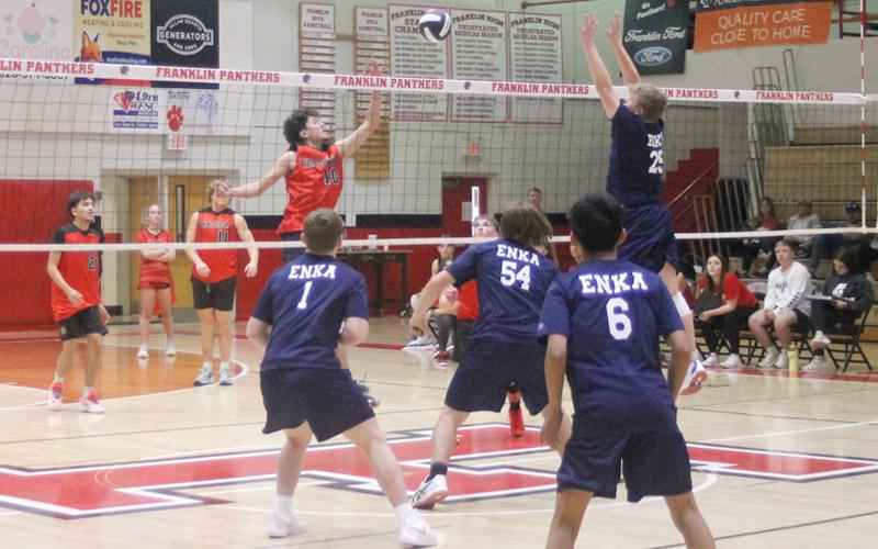 Press photo/Will Woolever. Sophomore Miguel Ortega lifts a ball over the net in Panther men’s volleyball’s first-ever home game March 19.
