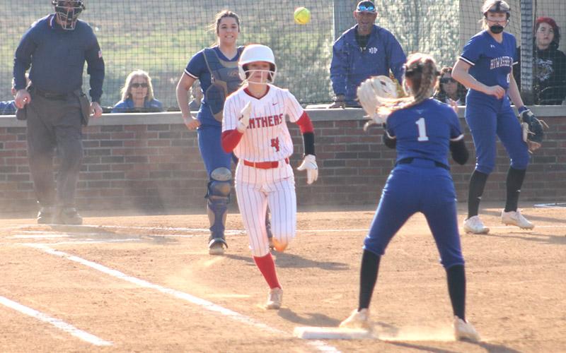 Press photo/Will Woolever. Freshman third baseman Layla Maloy tries to beat an out versus Hiwassee Dam March 21 at Macon Middle School.